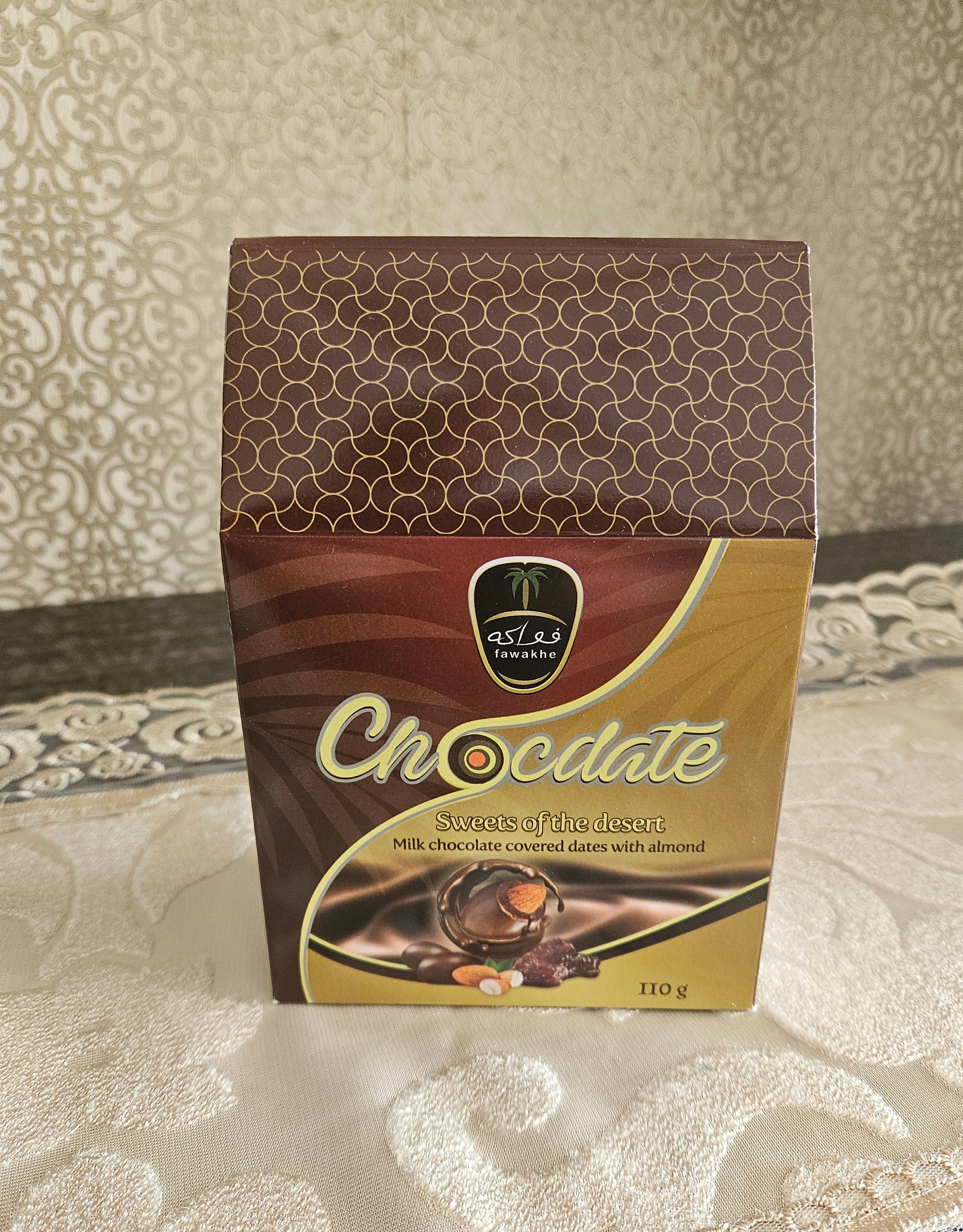 Chocolate packaging with a decorative pattern on a textured surface